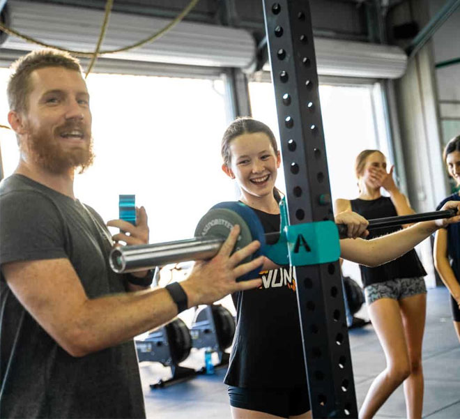 crossfit class lifting weights for teens